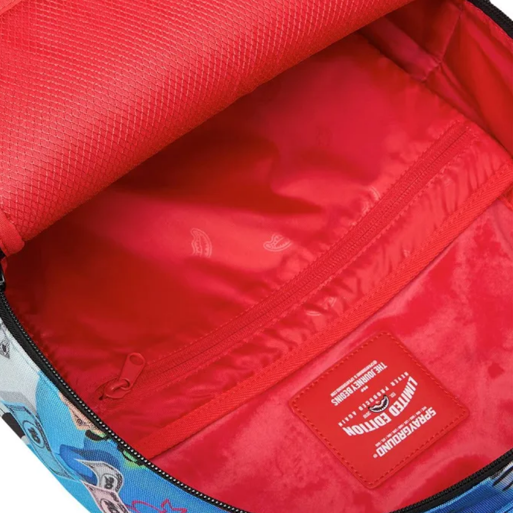 Sprayground Monopoly Blue Tear Through DLXSR Backpack